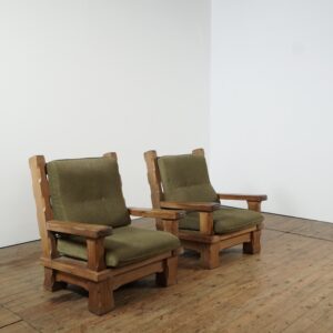 Set of two brutalist oak armchairs