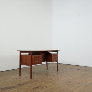 Danish teak desk with hidden bar by Gunnar Nielsen Tibergaard