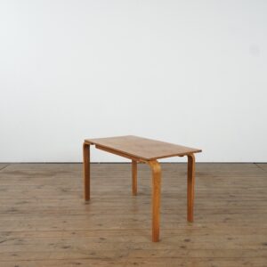 Plywood side table, children's desk, in the style of Alvaro Alto