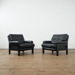 Set of two faux leather armchairs