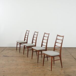 Set of 4 teak dining chairs with new fabric by Niels Koefoed