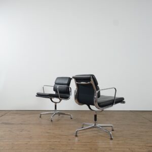 Two leather soft pad EA swivel chairs by Eames for Vitra (one sold)